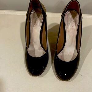 Gently worn Chloe black patent and snakeskin pumps.